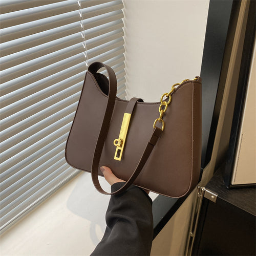 Damen Handtasche mit elegantem Kettenakzent und modernem Klappenverschluss Nord Taschen