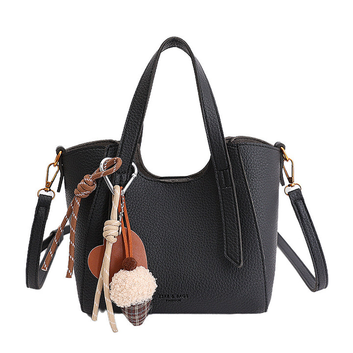 Damen Mini-Handtasche im eleganten Design mit charmantem Anhänger Nord Taschen