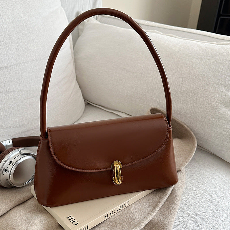 Damen elegante Handtasche mit geschwungenem Design und hochwertigem Kettenverschluss Nord Taschen