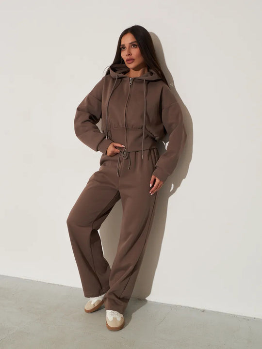 Damen kurzes Kapuzen-Zipshirt mit tailliertem Tunnelzug und weit geschnittene High-Waist-Loungehose Nord Taschen