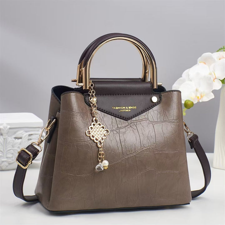 Damen elegante Handtasche mit goldenen Akzenten Nord Taschen