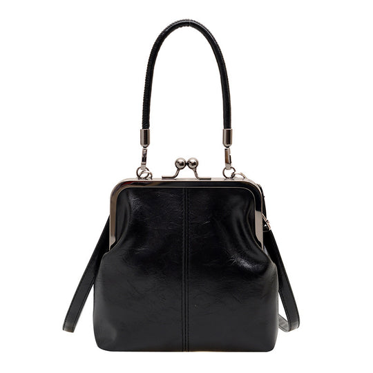 Damen elegante Handtasche mit robustem Metallverschluss Nord Taschen