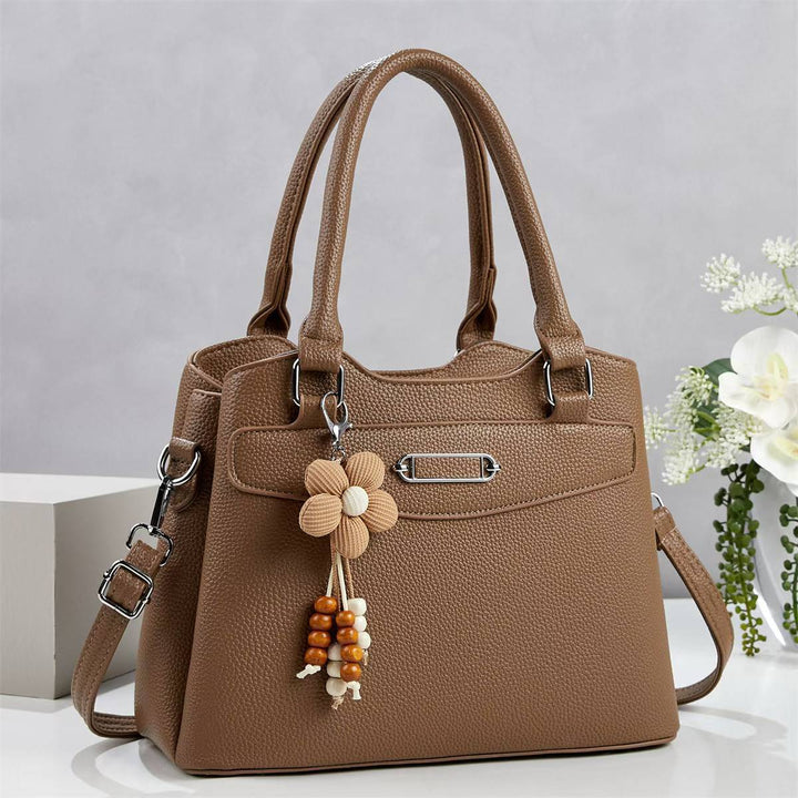 Damen elegante Handtasche mit abnehmbarem Blumen-Anhänger Nord Taschen