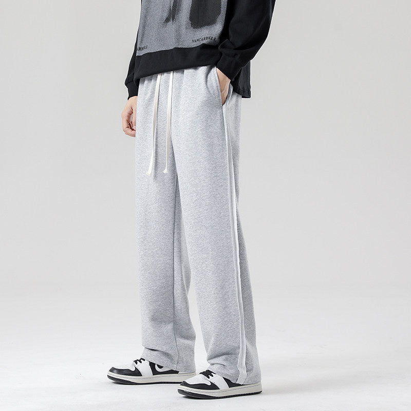 Herren weite Jogginghose im Oversize-Schnitt mit Seitenstreifen, Kordelzug & Fleecefutter Nord Taschen