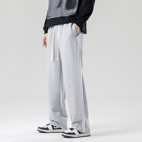 Herren weite Jogginghose im Oversize-Schnitt mit Seitenstreifen, Kordelzug & Fleecefutter Nord Taschen