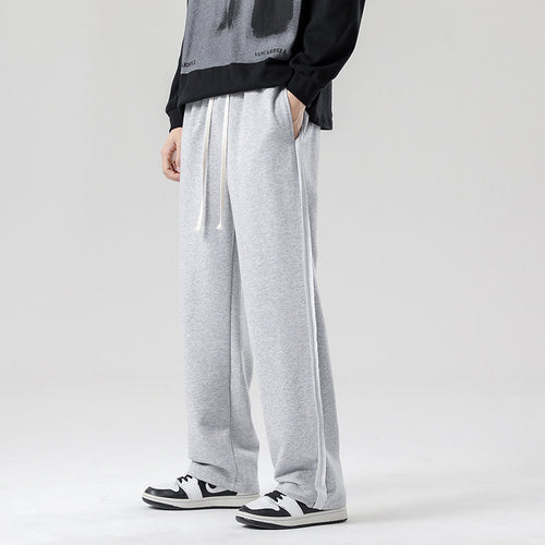 Herren weite Jogginghose im Oversize-Schnitt mit Seitenstreifen, Kordelzug & Fleecefutter Nord Taschen