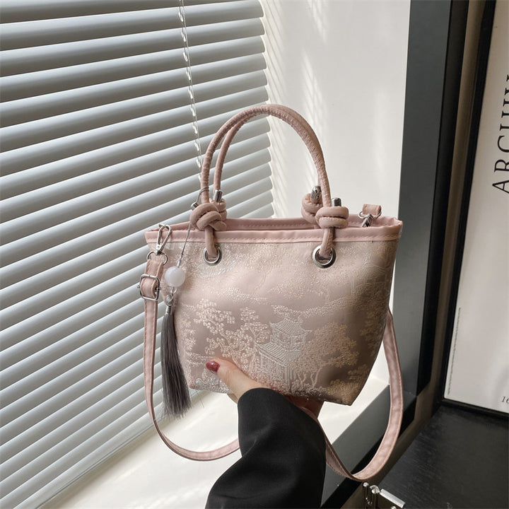 Damen elegante Umhängetasche mit floralem Design und kunstvollen Details Nord Taschen
