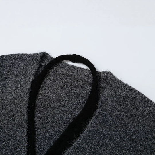Damen Oversize Strickcardigan mit tiefem V Ausschnitt und Rippbund Nord Taschen
