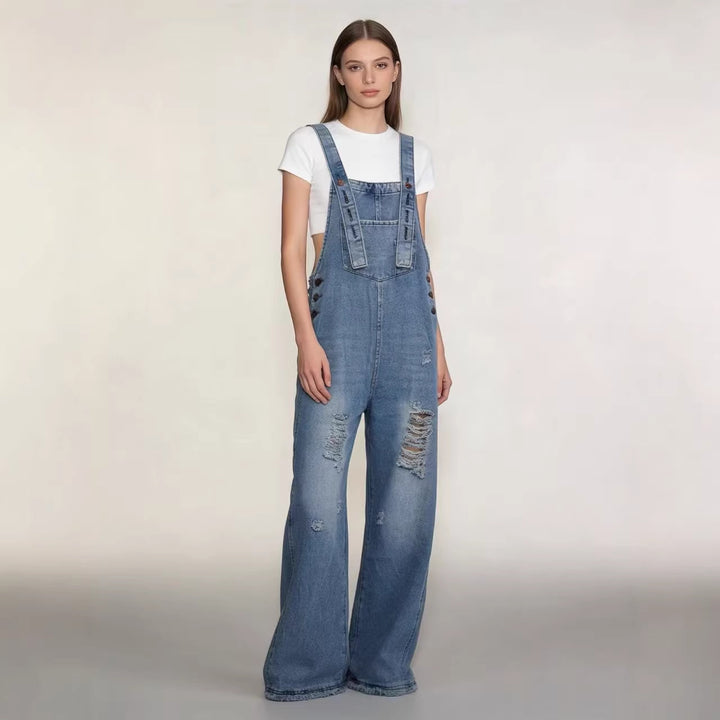 Damen moderne Baggy-Latzhose aus pigmentgefärbtem Stretch-Denim mit verstellbaren Trägern und sichtbaren Rissen Nord Taschen