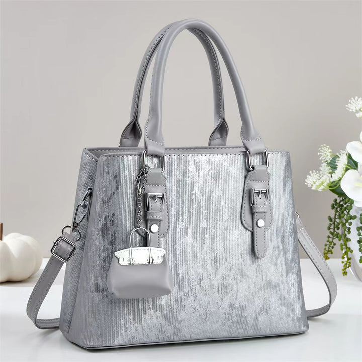 Damen elegante Handtasche mit dekorativem Schlüsselanhänger Nord Taschen