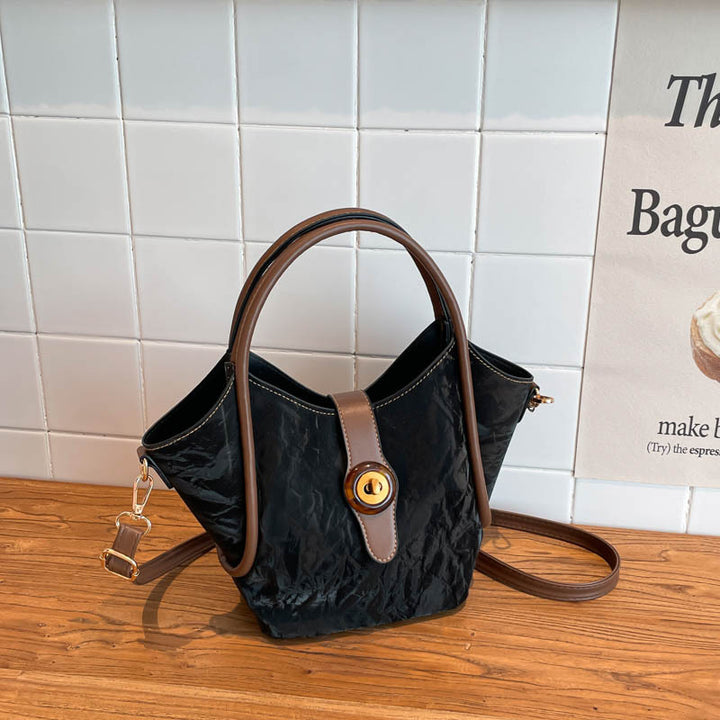 Damen elegante Umhängetasche mit einzigartigem Verschluss und strukturiertem Obermaterial Nord Taschen