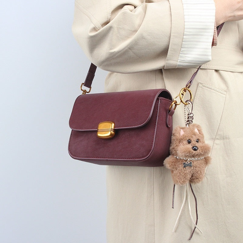 Damen Elegante Umhängetasche mit dekorativem Anhänger Nord Taschen