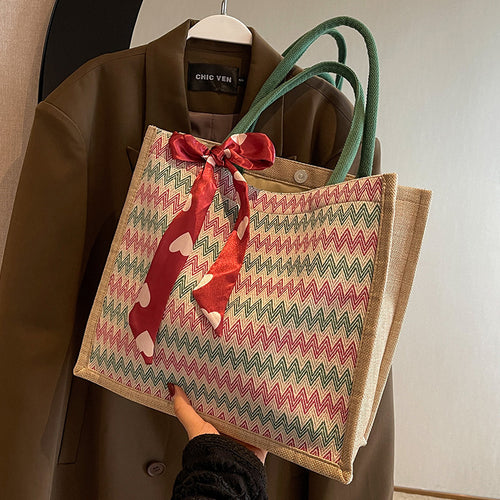 Damen Jute-Shopper mit modernem Wellenmuster und dekorativem Schleifenakzent Nord Taschen