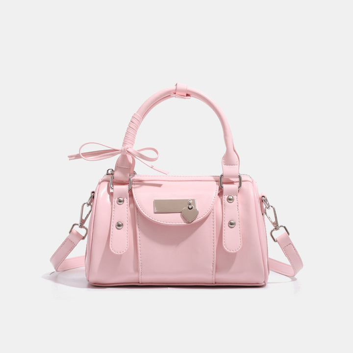 Damen Handtasche im eleganten, glänzenden Stil mit dekorativem Anhänger Nord Taschen