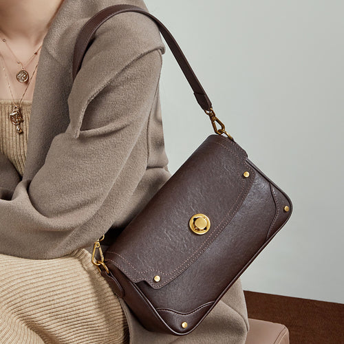 Damen Umhängetasche aus hochwertigem Kunstleder mit eleganter Klappenöffnung Nord Taschen
