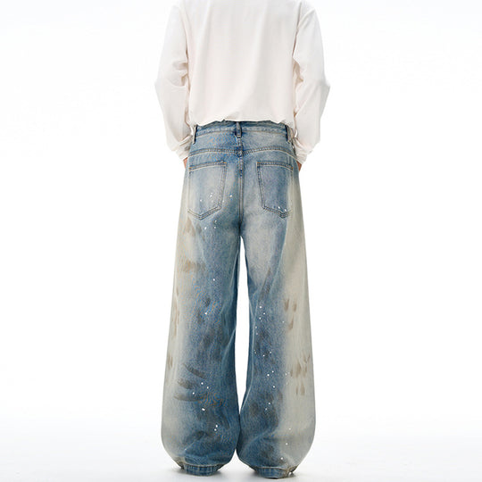 Herren Oversize-Baggy-Denim-Jeans mit künstlerischem Farb-Splatter und weitem Saum Nord Taschen