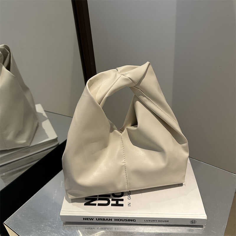 Damen Hobo-Tasche mit dekorativem Knotenverschluss und geschmeidiger Kunstlederoberfläche Nord Taschen