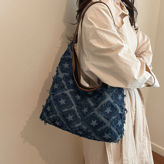 Damen Hobo-Tasche mit buntem Sternenmuster und fransigen Akzenten Nord Taschen