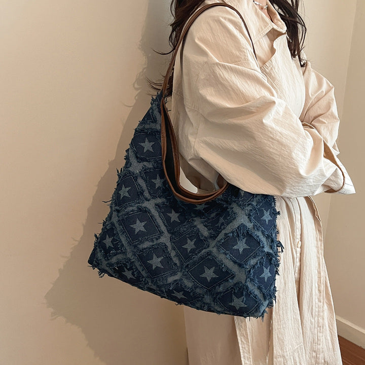 Damen Hobo-Tasche mit buntem Sternenmuster und fransigen Akzenten Nord Taschen
