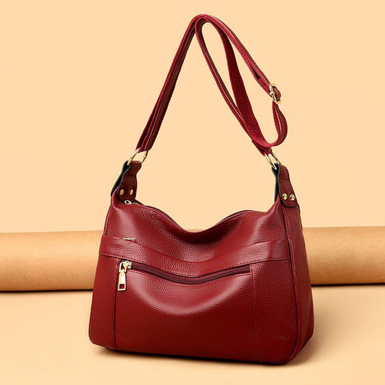 Nord Taschen | Leder-Umhängetasche für Damen - Hochwertige Schultertasche mit praktischen Reißverschlusstaschen
