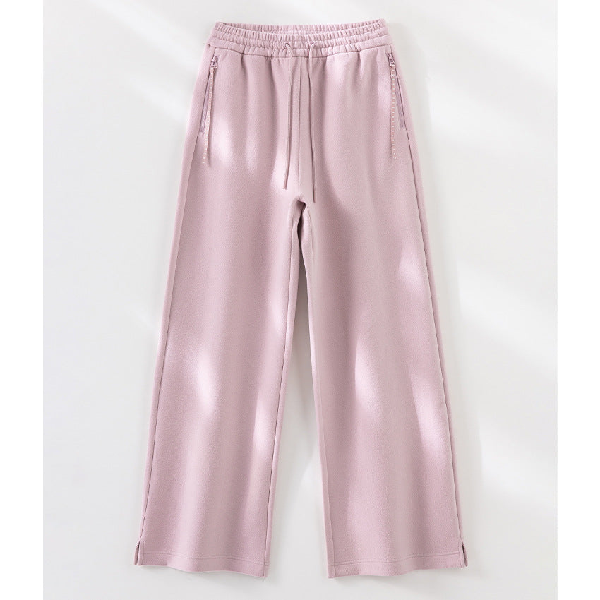 Damen Weite Highwaist Sweathose mit Tunnelzug, Eingrifftaschen und Saumschlitz Nord Taschen