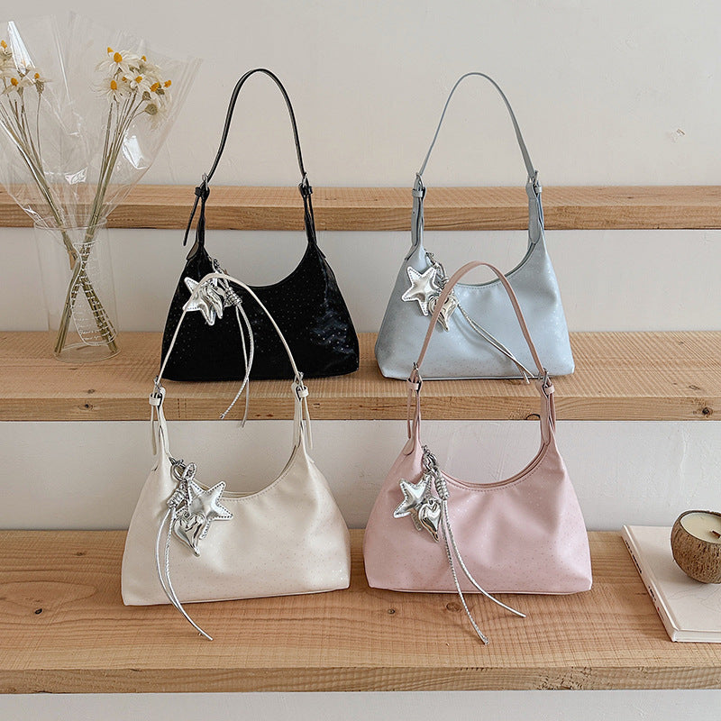 Damen elegante Schultertasche mit einzigartigem Schmuckanhänger Nord Taschen