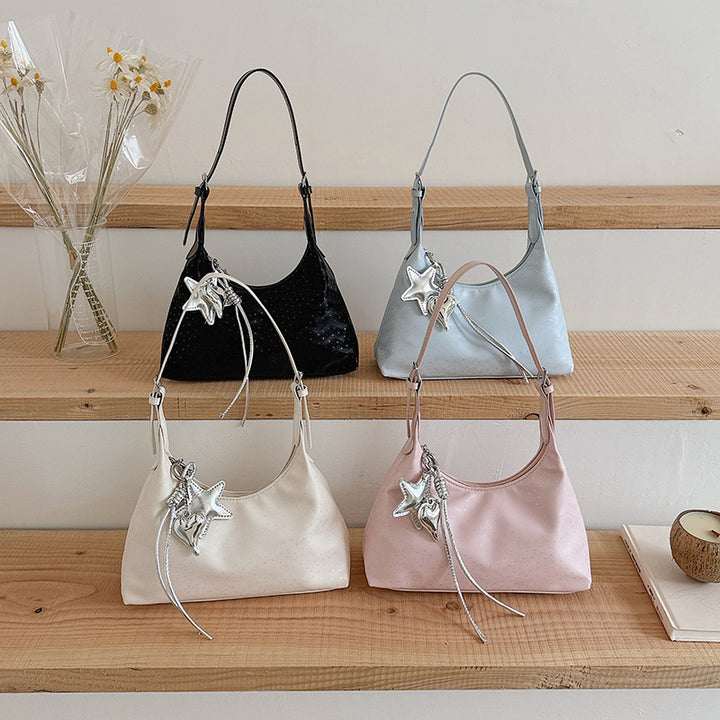 Damen elegante Schultertasche mit einzigartigem Schmuckanhänger Nord Taschen