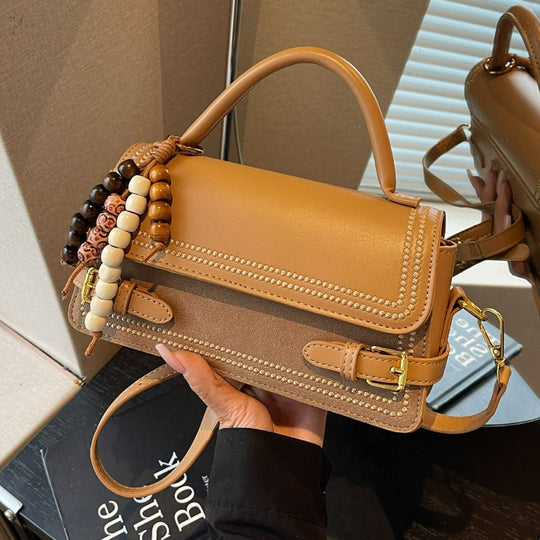Damen elegante Umhängetasche mit kunstvoll geflochtenen Details Nord Taschen