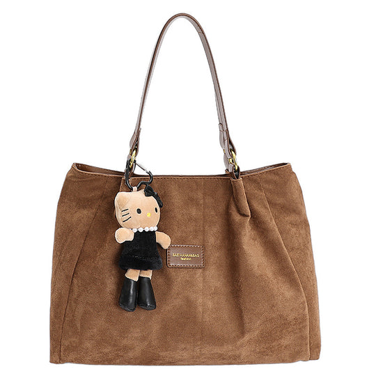 Damen Hobo-Tasche aus weichem Veloursleder mit niedlichem Anhänger Nord Taschen
