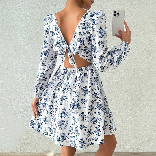 Damen florales Minikleid mit quadratischem Ausschnitt tailliertem Schößchen und langen Puffärmeln Nord Taschen