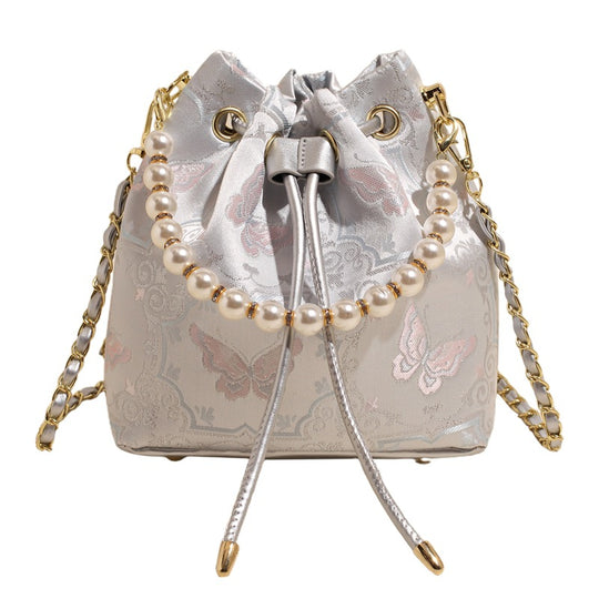 Damen Umhängetasche mit luxuriösem Perlenbesatz und floralen Details Nord Taschen