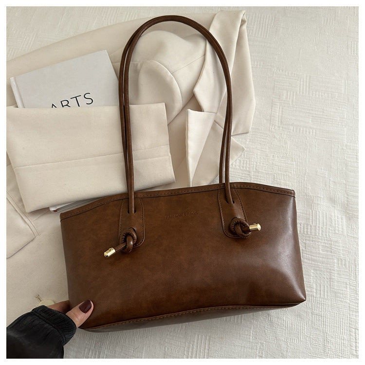 Damen Handtasche im minimalistischen Design mit edlen Akzenten Nord Taschen