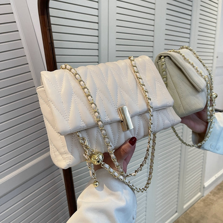 Damen elegante Umhängetasche mit Steppdesign und goldenen Akzenten Nord Taschen