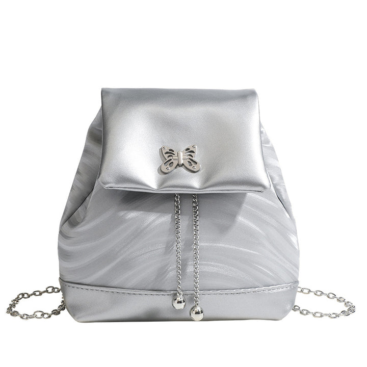 Damen Rucksackhandtasche mit verspieltem Schmetterlingsverschluss und eleganter Oberflächenstruktur Nord Taschen