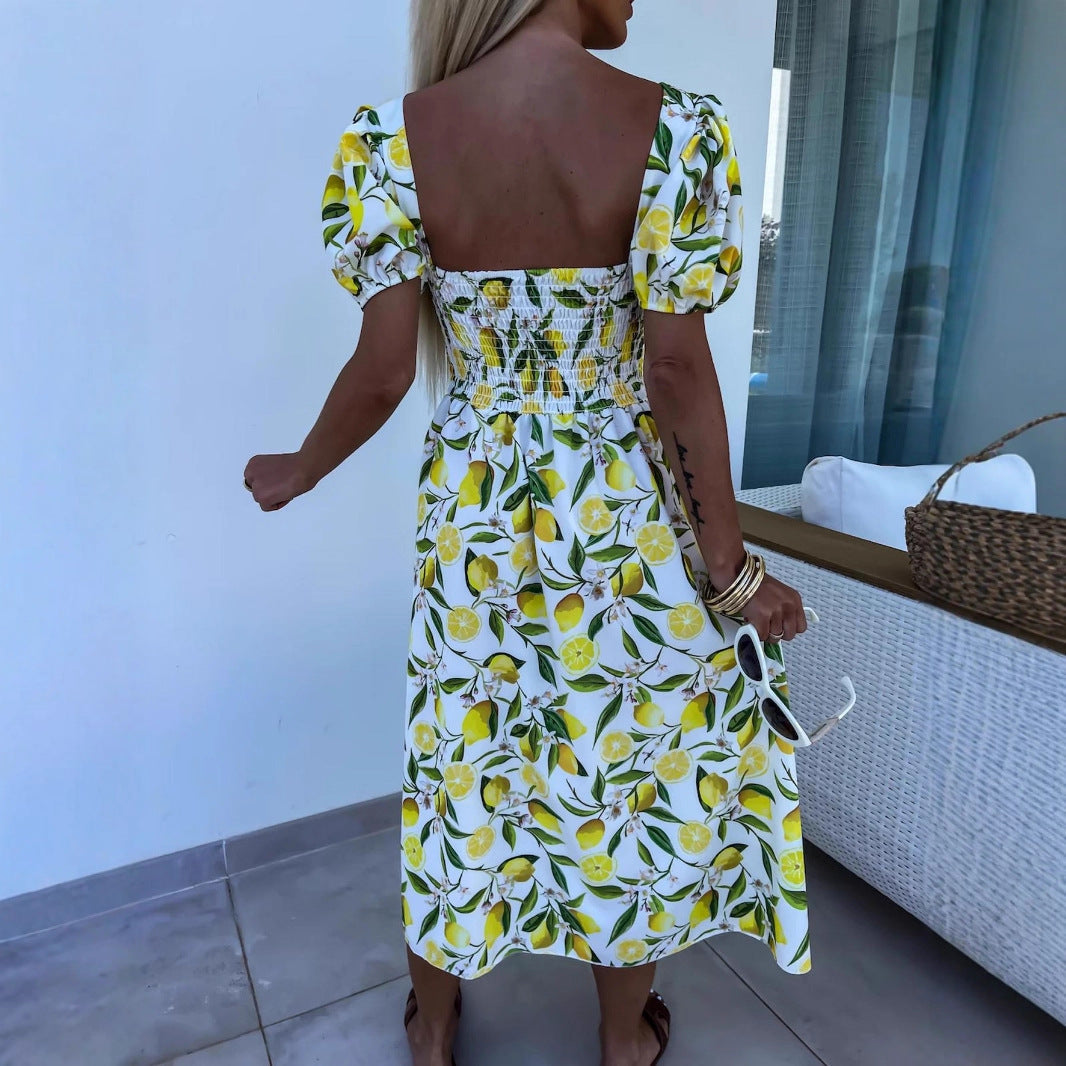 Damen Maxi Kleid mit Fruchtmotiv und Cut-Out-Details