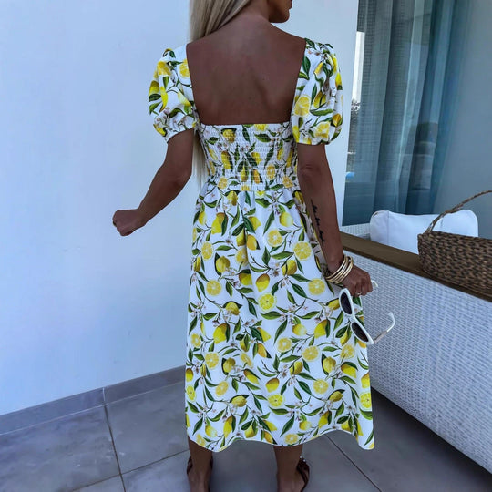 Damen Maxi Kleid mit Fruchtmotiv und Cut-Out-Details