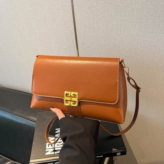 Damen Umhängetasche mit elegantem Klappverschluss und luxuriösen Details Nord Taschen