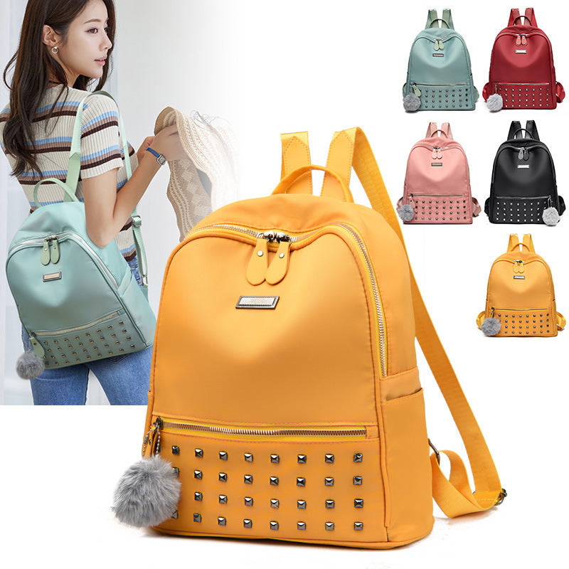 Damen modischer Rucksack mit Nieten und Pom-Pom Nord Taschen