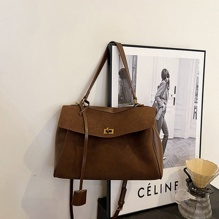 Damen elegante Umhängetasche mit schickem Klappverschluss | Nord Taschen