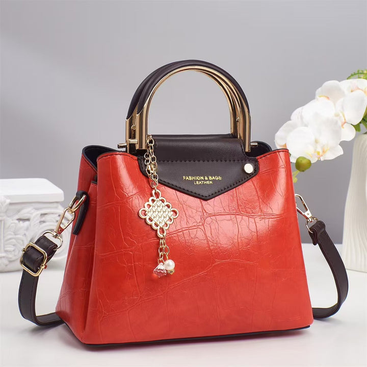 Damen elegante Handtasche mit goldenen Akzenten Nord Taschen