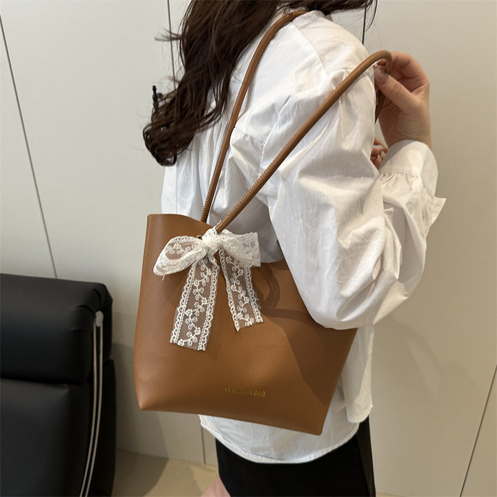 Damen Tote-Tasche aus hochwertigem Kunstleder mit verspieltem Schleifendetail Nord Taschen