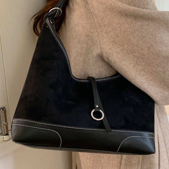 Damen Hobo-Tasche aus weichem Wildleder mit eleganter Silhouette und praktischen Fächern Nord Taschen