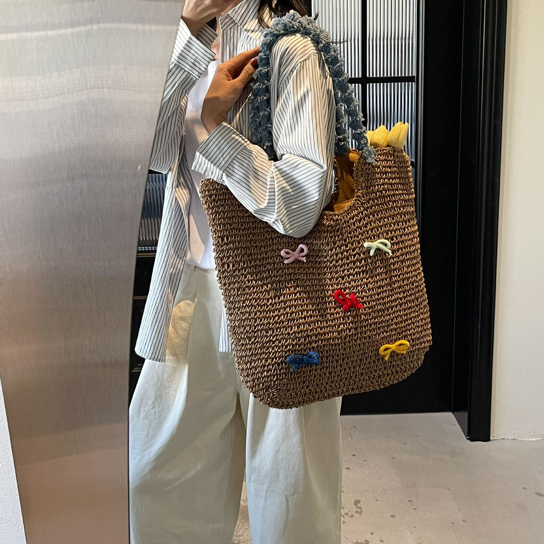 Damen Strandtasche aus handgewebtem Naturmaterial mit gestreiften Griffen Nord Taschen