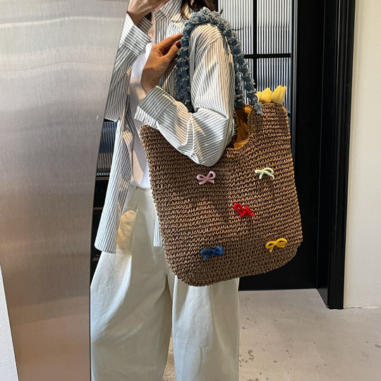 Damen Strandtasche aus handgewebtem Naturmaterial mit gestreiften Griffen Nord Taschen