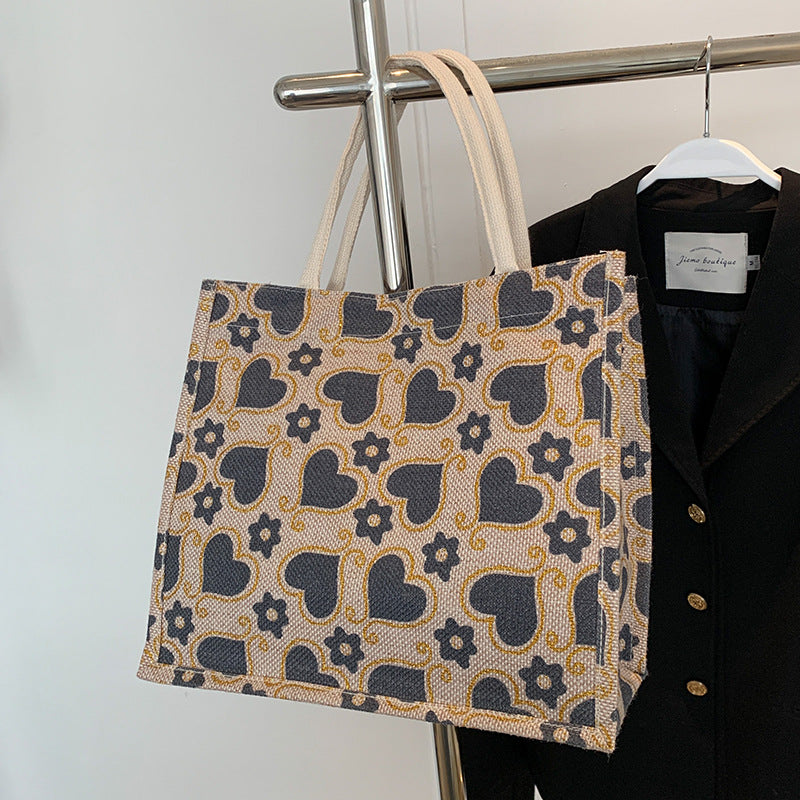 Damen Tragetasche mit floralem Herzdesign und stabilen Griffen Nord Taschen