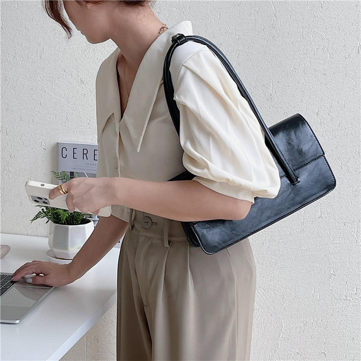 Damen elegante Umhängetasche mit hochwertiger Lederstruktur Nord Taschen