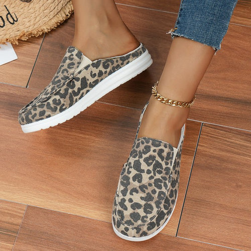 Damen  Slip-On Canvas‑Mules mit Kuhfleckenprint, gepolstertem Komfortfußbett und rutschfester Leichtsohle Nord Taschen