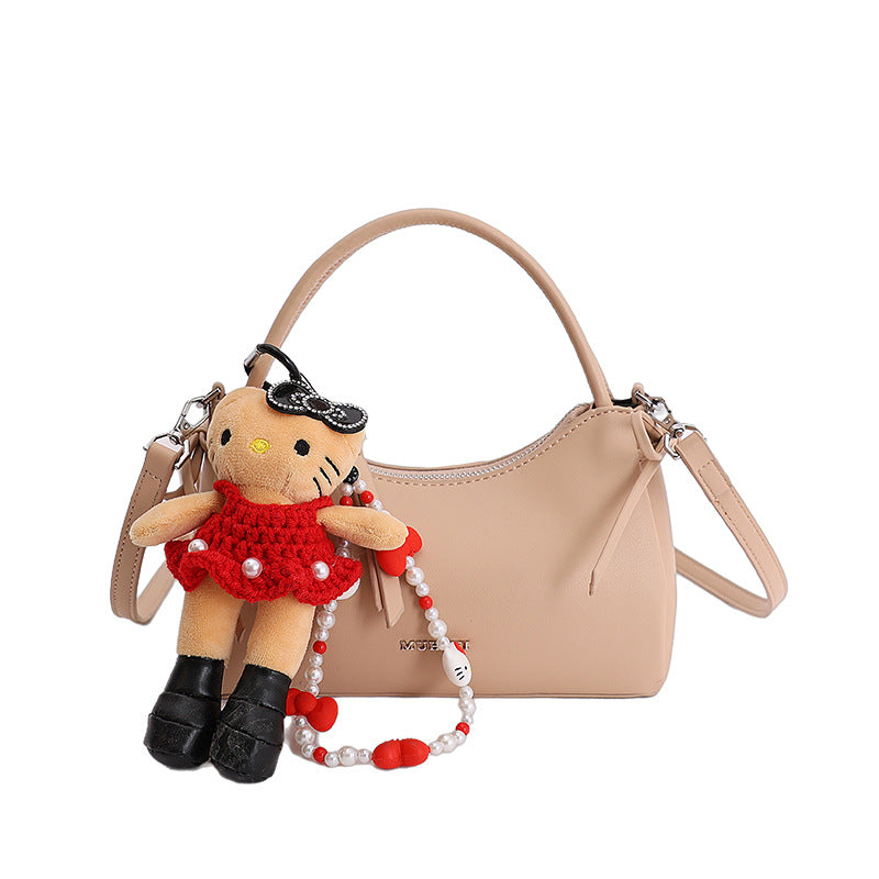 Damenhandtasche im charmanten Retro-Stil mit verspieltem Anhänger Nord Taschen