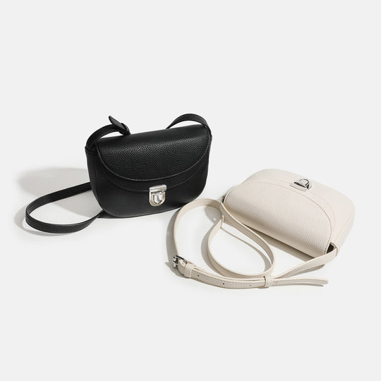 Damen Umhängetasche mit geschwungenem Design und eleganter Schnalle Nord Taschen