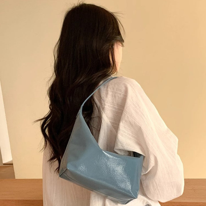 Damen Hobo-Tasche mit glänzender Oberfläche und modernem Design Nord Taschen